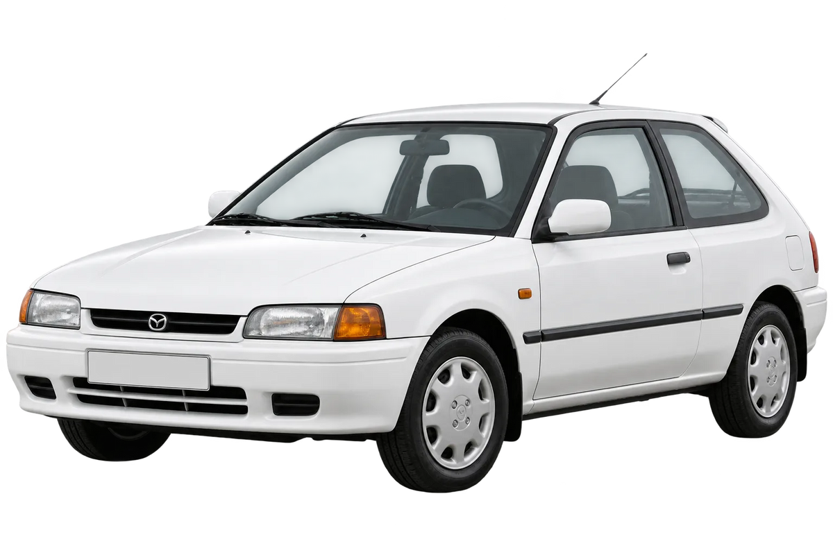Witte Mazda 323 BG, schuin van voren