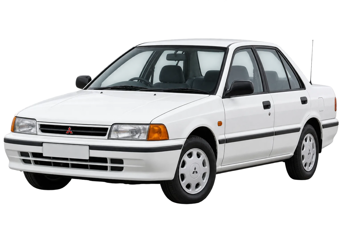 Witte Mitsubishi Lancer C50, schuin van voren